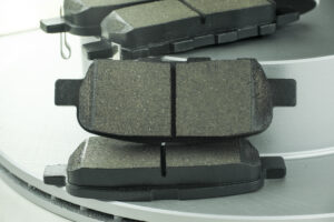 brake pads are black car pads lie brake discs car closeup