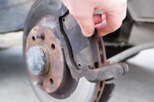 car repair replacing brake pads disc brakes brake disc closeup
