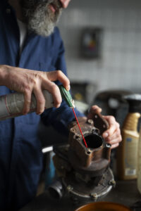 male mechanic working car auto repair shop