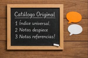 Pizarra con el borde de madera con el texto Catalogo Original escrito con tiza