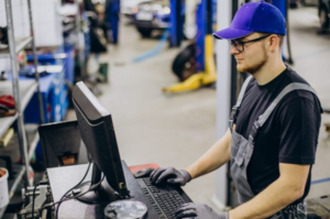 Car mechanist making car service